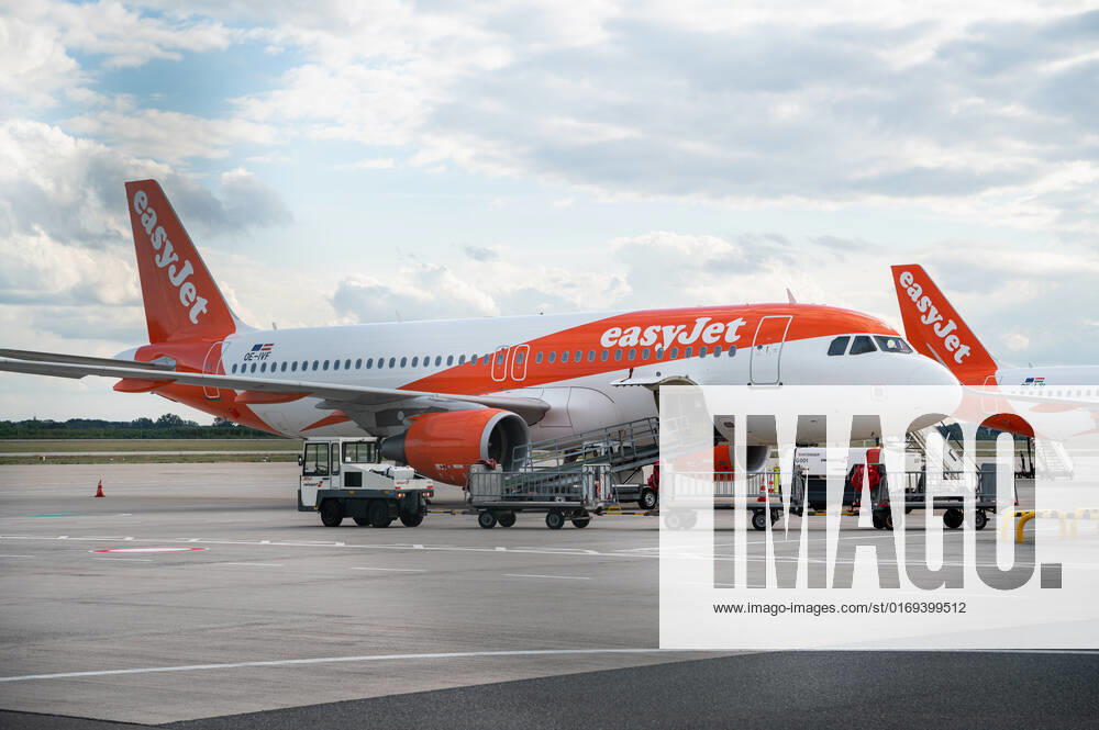 Berlin, Germany, Europe An Airbus A320 200 passenger aircraft of EasyJet Europe with registration OE IVF is parked on the apron at Berlin Brandenburg Willy Brandt Airport EasyJet is a British multinational low-cost airline headquartered at London Luton Airport