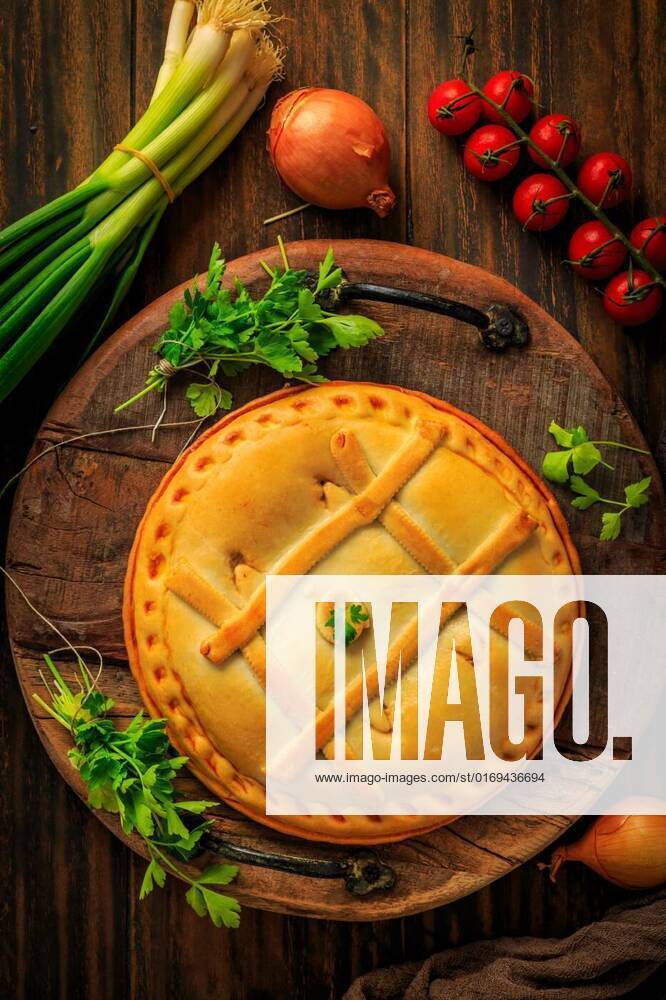 Empanada Gallega - traditional pie stuffed with tuna, Galician and Spanish cuisine., Empanada Gallega - traditional pie stuffed with tuna, Galician and Spanish cuisine. Tart with tuna and vegetables., Empanada Gallega - traditional pie stuffed with tuna, Galician and Spanish cuisine. Tart with tuna and vegetables., 18.05.2022,