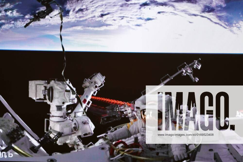 (220917) -- BEIJING, Sept. 17, 2022 -- Screen image captured at Beijing Aerospace Control Center on Sept. 17, 2022 shows Shenzhou-14 astronaut Cai Xuzhe exiting the space station lab module Wentian to conduct extravehicular activities (EVAs). China s Shenzhou-14 astronauts Cai Xuzhe and Chen Dong successfully exited the space station lab module Wentian on Saturday to conduct EVAs, according to the China Manned Space Agency (CMSA). ) (EyesonSci)CHINA-WENTIAN-SHENZHOU-14 ASTRONAUTS-EXTRAVEHICULAR ACTIVITIES (CN) GuoxZhongzheng