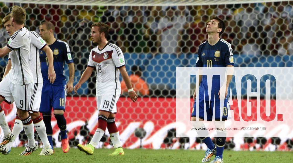 RIO DE JANEIRO, July 13, 2014 (Xinhua) -- Argentina s Lionel Messi (1st R) reacts after the final match between Germany and Argentina of 2014 FIFA World Cup at the Estadio do Maracana Stadium in Rio de Janeiro, Brazil, on July 13, 2014. Germany won 1-0 over Argentina after 120 minutes and took its fourth World Cup title on Sunday. (Xinhua Yang Lei)(pcy) (SP)BRAZIL-RIO DE JANEIRO-WORLD CUP 2014-FINAL-GERMANY VS ARGENTINA