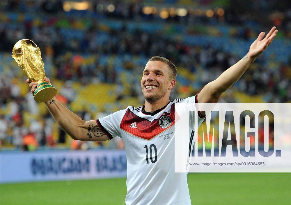 Lukas Podolski of Germany celebrates with the trophy following the 2014 FIFA World Cup Final at the Estadio do Maracana in Rio de Janeiro, Brazil on July 13, 2014. RIO2014071307