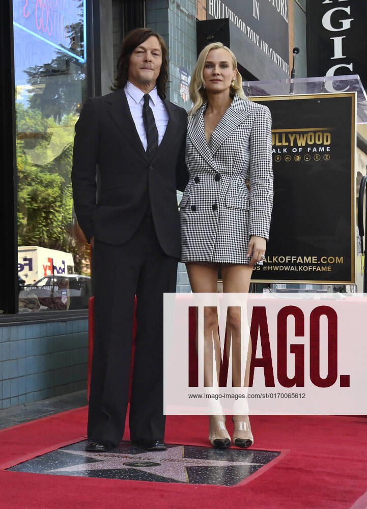 Actor Norman Reedus is joined by his partner, actress Diane Kruger during an unveiling ceremony honoring him with the 2,734th star on the Hollywood Walk of Fame in Los Angeles on Tuesday, September 27, 2022. 1 LAP2022092708 JIMxRUYMEN