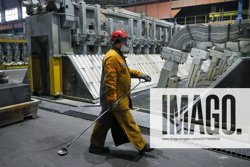 SHELEKHOV, IRKUTSK REGION, RUSSIA – SEPTEMBER 27, 2022: A worker at the Irkutsk Aluminum Smelter (IrkAZ) operated by Rusal of the En+ Groupâ€s Metals segment. The plant was commissioned in 1962. By 2022, the volume of aluminum production reached 422 thousand tonnes per year; it uses electricity generated at the Irkutsk Hydroelectric Power Station. Vladimir Smirnov TASS TS144368