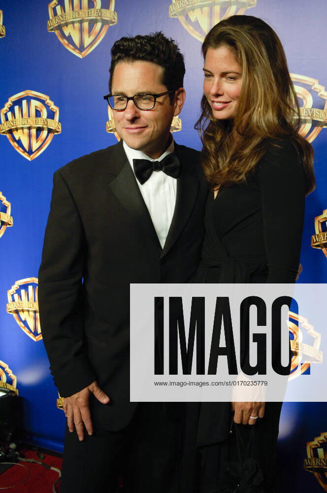 Director J.j. Abrams and actress Katie McGrath attends arrivals for the 58th Annual Primetime Emmy Awards Warner Bros. Television Party at Cicada on August 28, 2006 in Los Angeles, California. USA - 2006 - Warner Bros. Television Party in Los Angeles - Arrivals