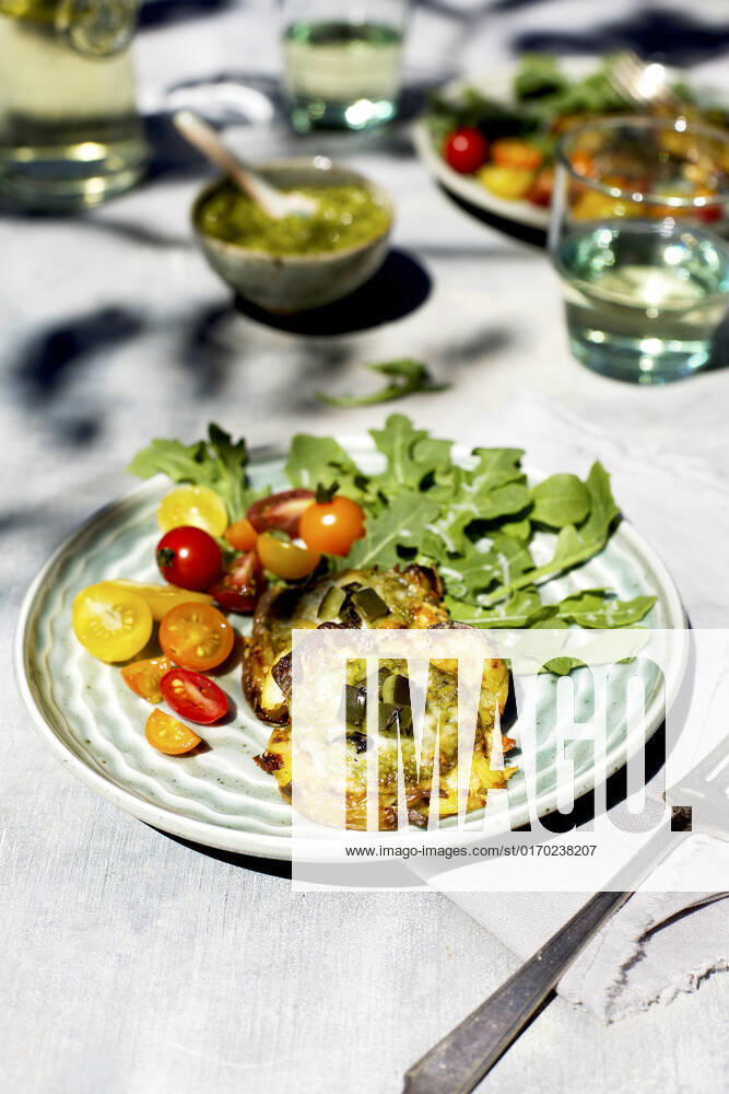 Roasted Poblano Pesto Smashed Potatoes served on a bed of arugula and cherry tomatoes Roasted Poblano Pesto Smashed Potatoes served on a bed of arugula and cherry tomatoes