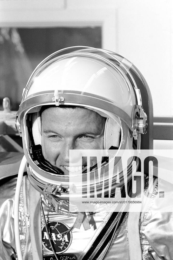 (1963) --- Astronaut L. Gordon Cooper Jr., prime pilot for the Mercury-Atlas 9 (MA-9) mission, relaxes while waiting for weight and balance tests to begin. 1062_36_M_-2607-