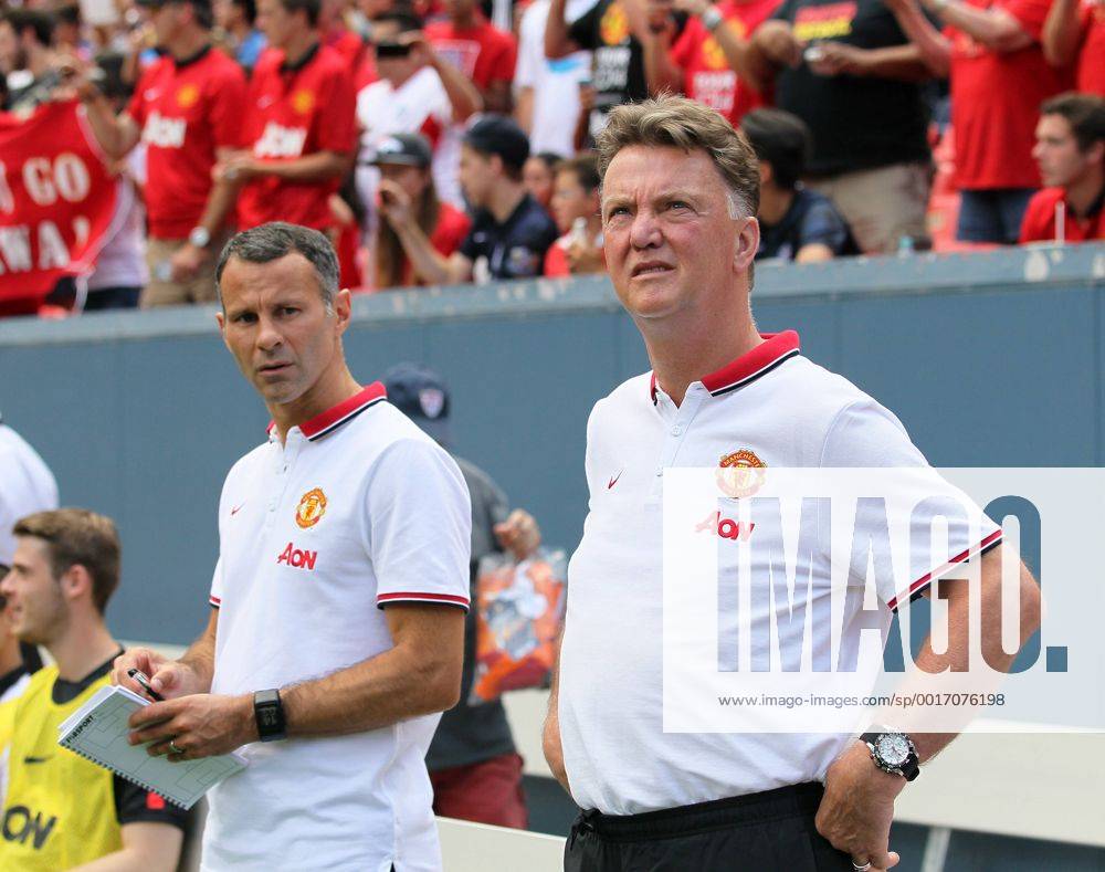 Manchester United s Louis Van Gaal looks on with Ryan Giggs - International Champions Cup 2014 - AS Roma v Manchester United - Sports Authority Field - Denver - USA - 26th July 2014 - Picture David Klein Sportimage .