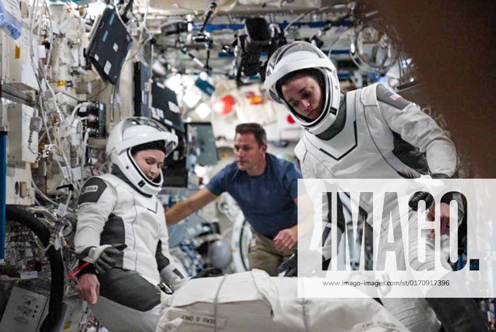 ESA astronaut Samantha Cristoforetti (L) and NASA astronaut Jessica Watkins of the SpaceX Crew-4 space mission are seen inside a Crew Dragon spacecraft before undocking from the International Space Station (ISS). The spacecraft s undocking has been delayed several times due to weather. Dmitry Petelin TASS 55346914