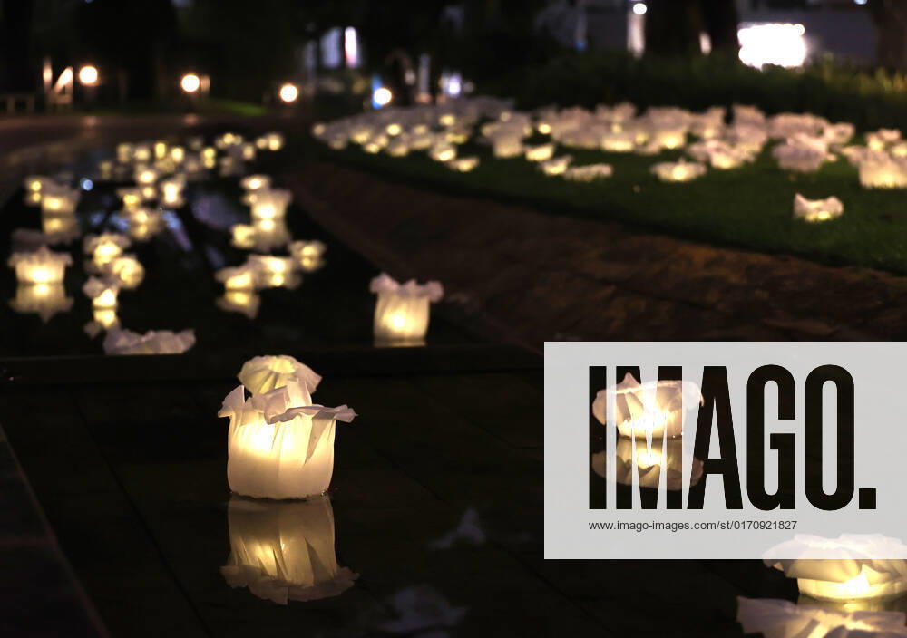 Tokyo, Japan - An installation as it is. -equilibrium flower- of some 2,000 flower like objects with small LED lights is displayed at a park of the Tokyo Midtown as a part of the Tokyo Midtown Design Touch 2022 in Tokyo on Friday, October 14, 2022. An annual design event with the theme of Design for Sustainable Future started at the Tokyo Midtown through November 3. , aflo_201255388.jpg,