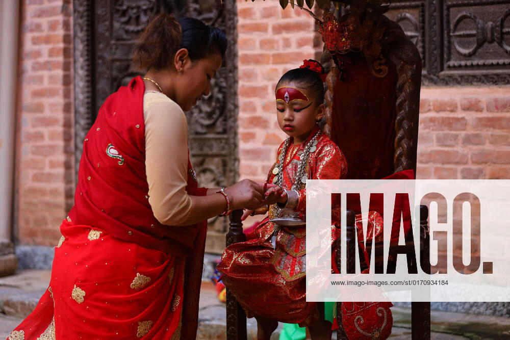Nepal s Living Goddess-Kumari of Bungmati Yubika Bajracharya, the newly anointed Living Goddess- Kumari of Bungmati, a town in the outskirts of Lalitpur District of Nepal is being prepared to give blessing to public. Nepal has a unique tradition of appointing and worshipping pre-pubescent girls as re-incarnation of Goddess Taleju Bhawani. Every town in Nepal which has a temple of Taleju Bhawani has a girl as Living Goddess Kumari who is worshipped and revered by all. The Kumari of Kathmandu s Basantapur Durbar Square is considered the Royal one who is barely taken out of her residence. Lalitpur Bagmati Nepal