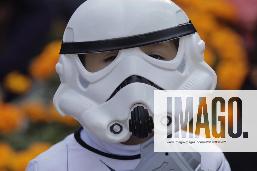 501st Legion Mexican Garrison Star Wars Parade, Mexico City A boy dressed as a Star Wars character Storm Tropper in front of a cempasuchil flower planter accompanies members of the 501st Legion Mexican Garrison Star Wars, who marched from the Angel of Independence to the Monument of the Revolution in Mexico City, after the parade was suspended two years ago due to the COVID-19 health emergency in Mexico. Training Day is an annual parade that takes place in different parts of Mexico. This 2022 is the first time it will be held on one of Mexico City s main avenues. Mexico City Mexico City Mexico