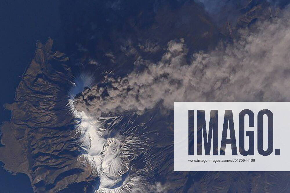 An image taken on the International Space Station (ISS) shows steam-gas emissions from the Chikurachki Volcano on the Kuril Islands. The emission that started on October 16, reaches the height of 6km above the sea level and extends 350km to the east. Best quality available. Dmitry Petelin TASS 55379171
