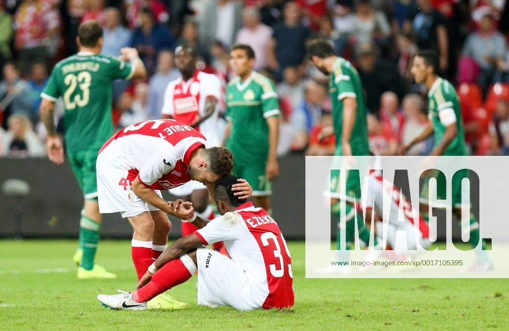 20140730 - LIEGE, BELGIUM: Standard d Francois Marquet and Standard s Imoh Ezekiel look dejected after a soccer game between Belgian first division team Standard de Liege and Greek Panathinaikos F.C., Wednesday 30 July 2014, in Liege, the first leg of the third qualifying round for the UEFA Champions League tournament. VIRGINIExLEFOUR premiumd 97431352