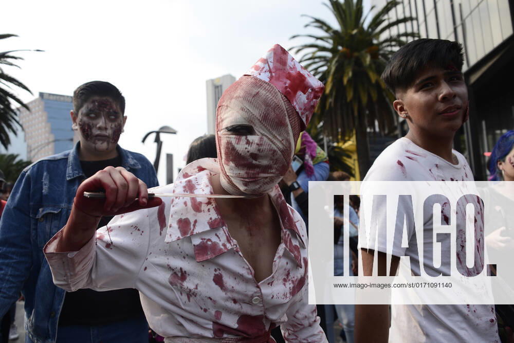 15th Annual Zombie Walk in Mexico October 22, Mexico City, Mexico: A participant walks during the 15th anniversary march of the annual Zombie Walk at Revolution Monumento. on October 22, 2022 in Mexico City, Mexico. (Photo by Carlos Tischler Eyepix Group)