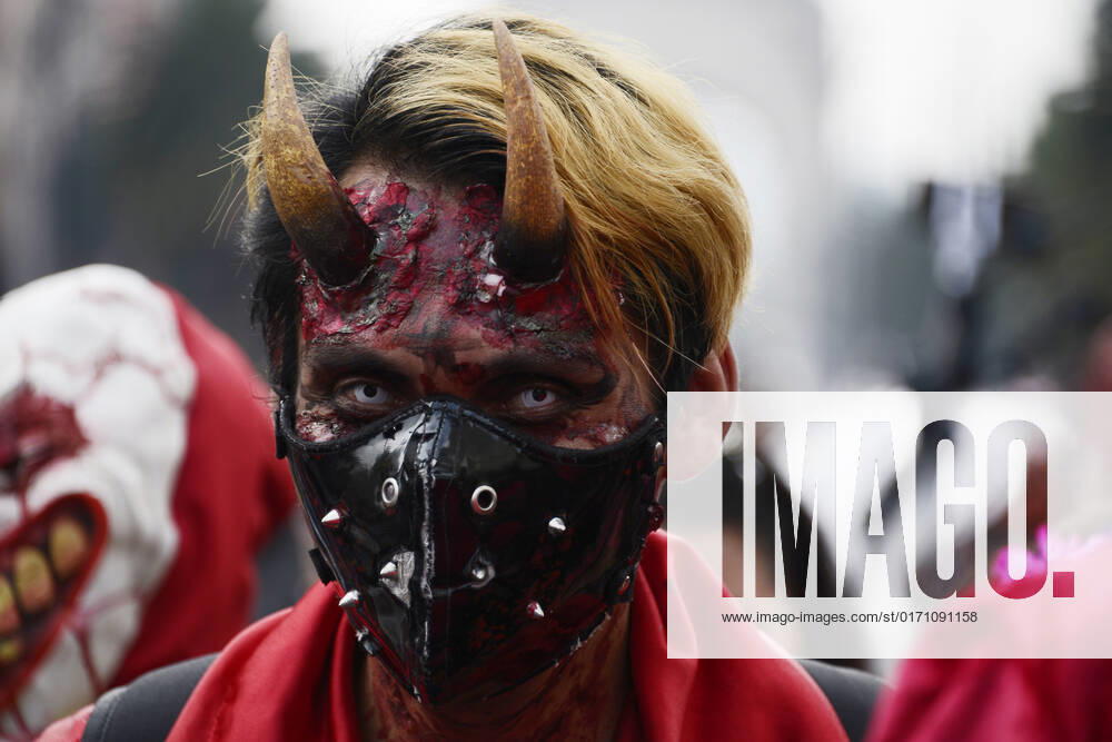 15th Annual Zombie Walk in Mexico October 22, Mexico City, Mexico: A participant walks during the 15th anniversary march of the annual Zombie Walk at Revolution Monumento. on October 22, 2022 in Mexico City, Mexico. (Photo by Carlos Tischler Eyepix Group)