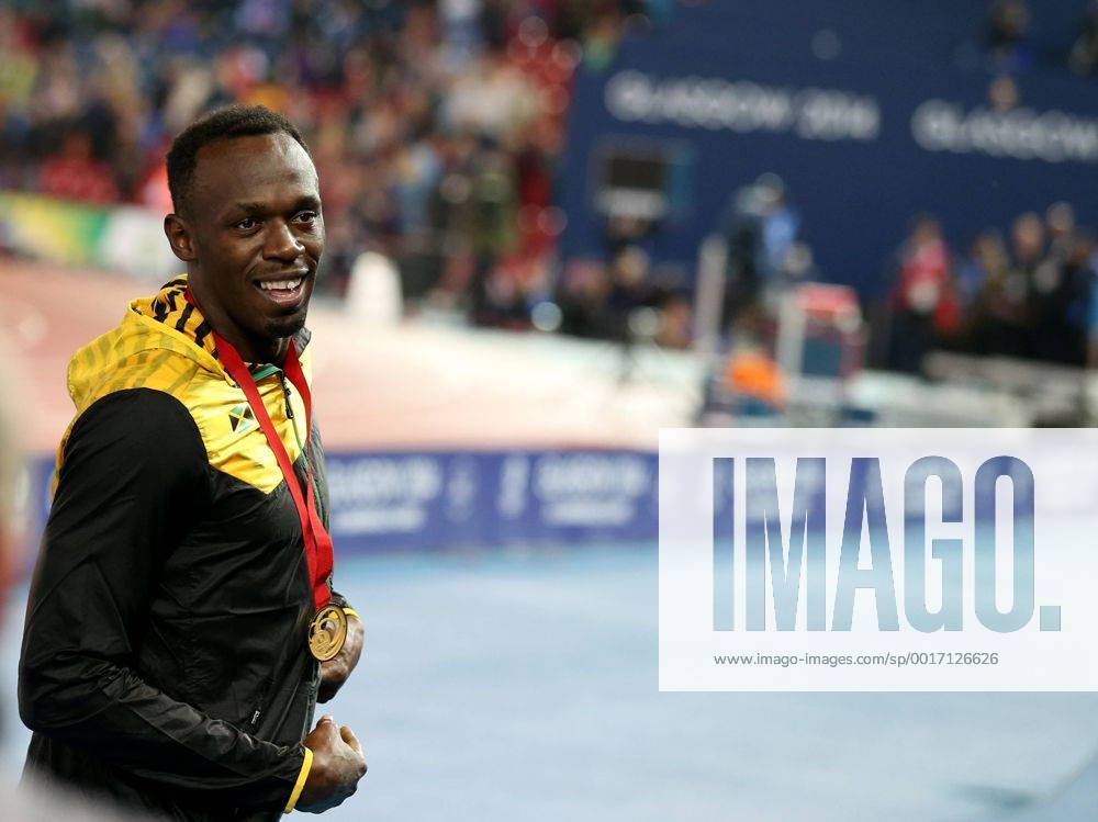 Usain Bolt of Jamaica reacts during the awarding ceremony for the men s 4X100m relay final of Athletics at the 2014 Glasgow Commonwealth Games in Hampden Park in Glasgow, Scotland on Aug. 2, 2014. Jamaica won the gold medal with a time of 37.58 seconds. ) (SP)BRITAIN-GLASGOW-COMMONWEALTH GAMES-ATHLETICS HanxYan