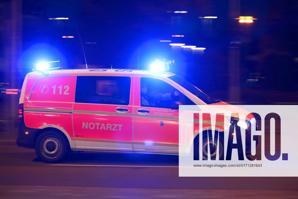 Dusseldorf, A rescue vehicle drives with blue light to a mission NRW Germany