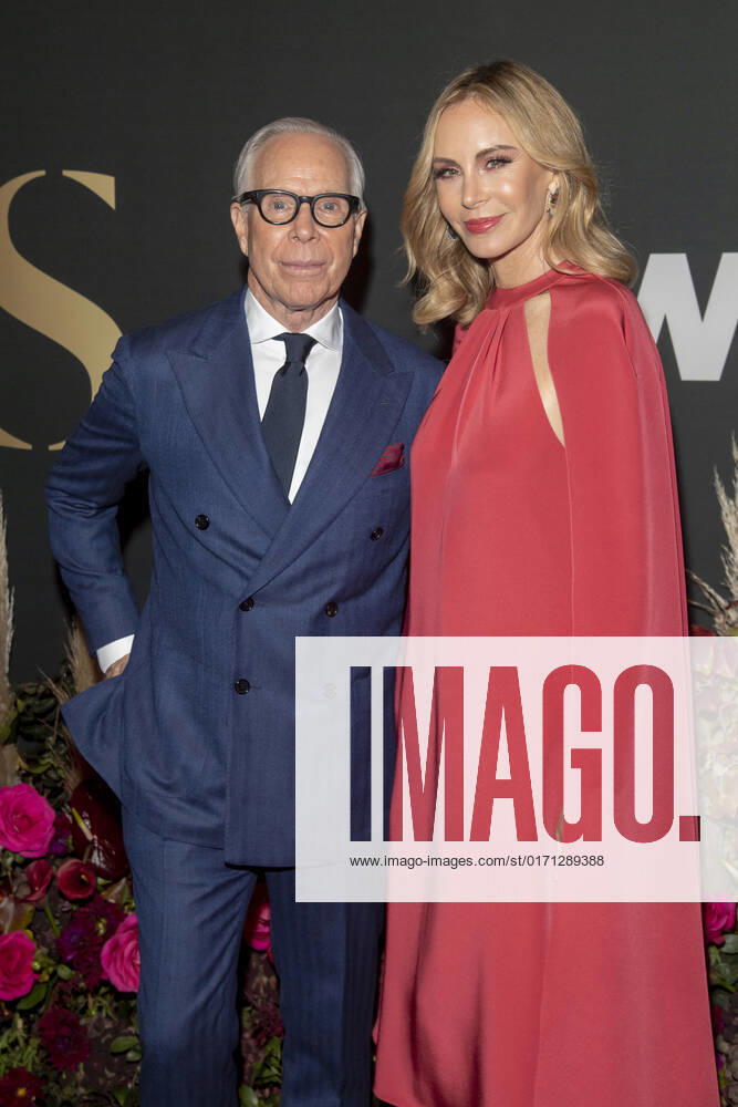 Tommy Hilfiger and Dee Ocleppo Hilfiger attend the 2022 WWD Honors at Cipriani South Street in New York City. New York United States - ZUMAs197 20221025_zaa_s197_276