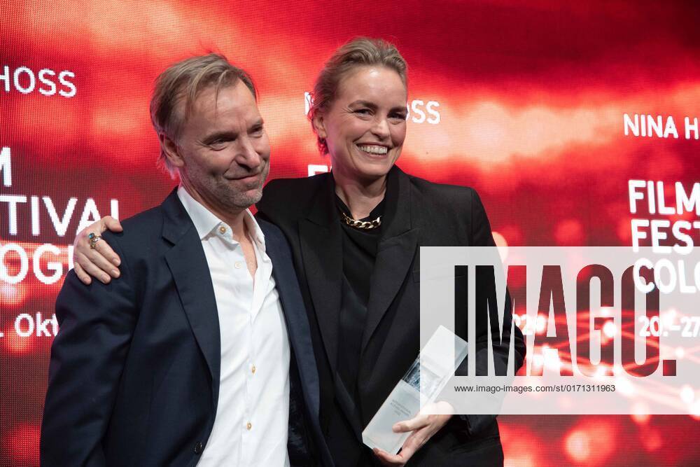 Actress Nina HOSS receives the International Actors Award, left laudator Mans MARLIND, director, Film Festival Cologne awards in Cologne