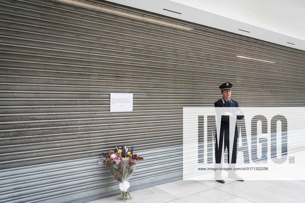 Milan - Carrefour Assago, shopping center. The day after the previous night s knife attack. In the photo: Assago councilor for security Marco La Rosa with the mayor Lara Carano bring a bouquet of flowers Editorial Usage Only