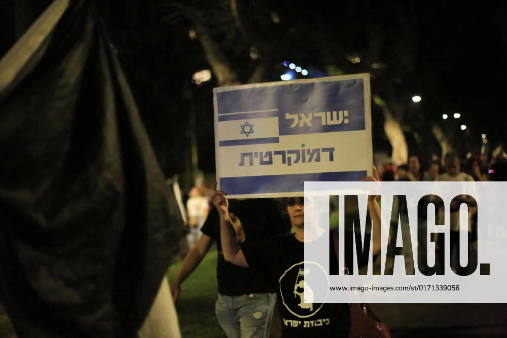 Demonstrators gather to rally against former Israeli Prime Minister Benjamin Netanyahu Demonstrators gather to rally against former Israeli Prime Minister Benjamin Netanyahu who is running as the leader of the Likud party on October 29, 2022 in Tel Aviv, Israel. Israelis return to the polls on November 1 for a fifth general election in four years. Photo by Saeed Qaq apaimages Tel Aviv Tel Aviv Israel 301022_APA_SQ__00 (19)
