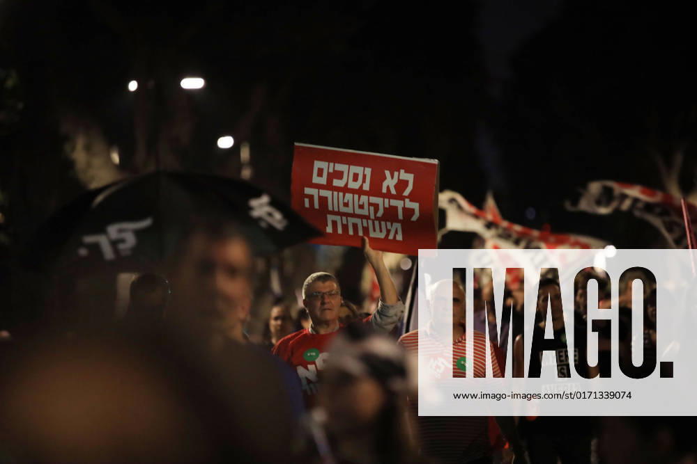 Demonstrators gather to rally against former Israeli Prime Minister Benjamin Netanyahu Demonstrators gather to rally against former Israeli Prime Minister Benjamin Netanyahu who is running as the leader of the Likud party on October 29, 2022 in Tel Aviv, Israel. Israelis return to the polls on November 1 for a fifth general election in four years. Photo by Saeed Qaq apaimages Tel Aviv Tel Aviv Israel 301022_APA_SQ__00 (6)