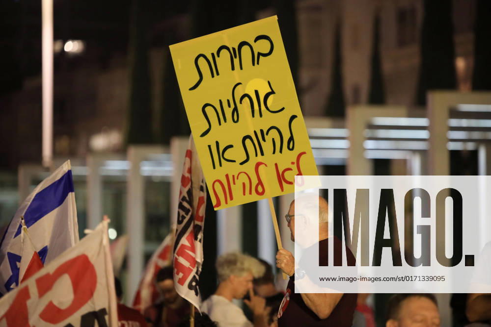 Demonstrators gather to rally against former Israeli Prime Minister Benjamin Netanyahu Demonstrators gather to rally against former Israeli Prime Minister Benjamin Netanyahu who is running as the leader of the Likud party on October 29, 2022 in Tel Aviv, Israel. Israelis return to the polls on November 1 for a fifth general election in four years. Photo by Saeed Qaq apaimages Tel Aviv Tel Aviv Israel 301022_APA_SQ__00 (1)