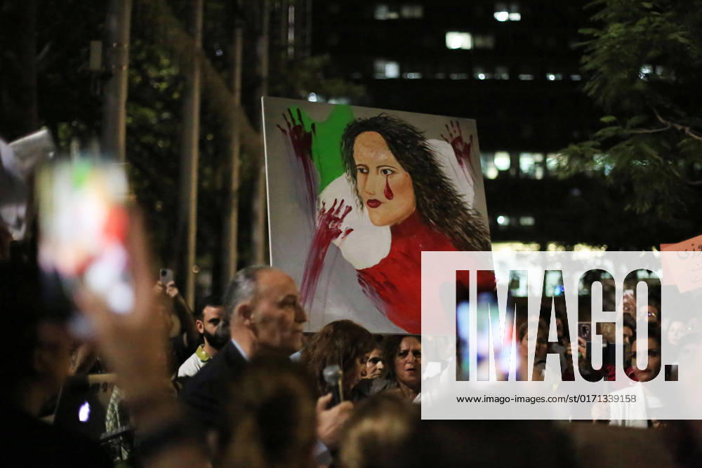 Demonstrators gather to rally against former Israeli Prime Minister Benjamin Netanyahu Demonstrators hold signs and Iranian flags as they protest against the death of Masha Amini and in solidarity with the Iranian protesters on October 29, 2022 in Tel Aviv, Israel. The march coincides with a series of similar events held today in cities around the world, in solidarity with Iranian activists driving a weeks-long protest movement in that country. Photo by Saeed Qaq apaimages Tel Aviv Tel Aviv Israel 291022_APA_SQ_00 (10)