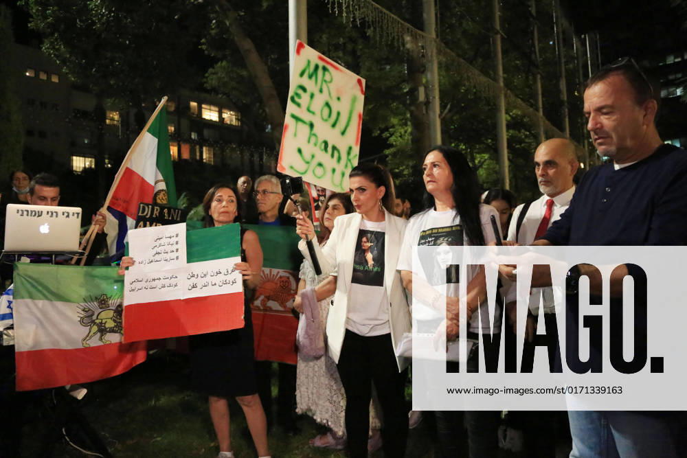 Demonstrators gather to rally against former Israeli Prime Minister Benjamin Netanyahu Demonstrators hold signs and Iranian flags as they protest against the death of Masha Amini and in solidarity with the Iranian protesters on October 29, 2022 in Tel Aviv, Israel. The march coincides with a series of similar events held today in cities around the world, in solidarity with Iranian activists driving a weeks-long protest movement in that country. Photo by Saeed Qaq apaimages Tel Aviv Tel Aviv Israel 291022_APA_SQ_00 (16)