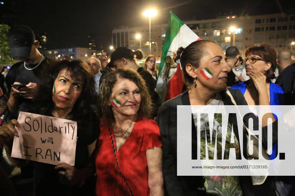 Demonstrators gather to rally against former Israeli Prime Minister Benjamin Netanyahu Demonstrators hold signs and Iranian flags as they protest against the death of Masha Amini and in solidarity with the Iranian protesters on October 29, 2022 in Tel Aviv, Israel. The march coincides with a series of similar events held today in cities around the world, in solidarity with Iranian activists driving a weeks-long protest movement in that country. Photo by Saeed Qaq apaimages Tel Aviv Tel Aviv Israel 291022_APA_SQ_00 (3)