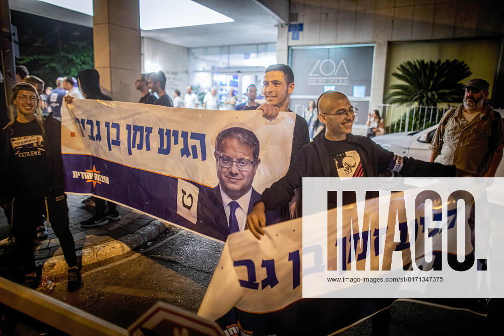 Israeli supporters of the ultra nationalist far right party Otzma Yehudit, and its leader Itamar Ben Gvir, hold banners with his portrait in Tel Aviv. Israel s 5th national elections in four years will take place on Nov 1. On Nov 2 Israelis might wake up to a reality in which its nationalist far-right party, Religious Zionism which includes the ultra-nationalist Otzma Yehudit party will be the third largest party in parliament and a key member of a coalition led by opposition leader and former prime minister Benjamin Netanyahu. Tel Aviv Israel - ZUMAs197 20221023_zaa_s197_458