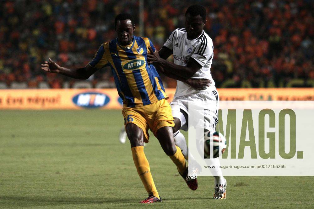 Vinicius of Apoel and Baah of Helsinki fight for the ball during their Champions League third qualifying round second leg against HJK Helsinki at GSP stadium in Nicosia, Cyprus, Tuesday, August 6, 2014 APOEL vs HJK Helsinki Champions League 2014 2015
