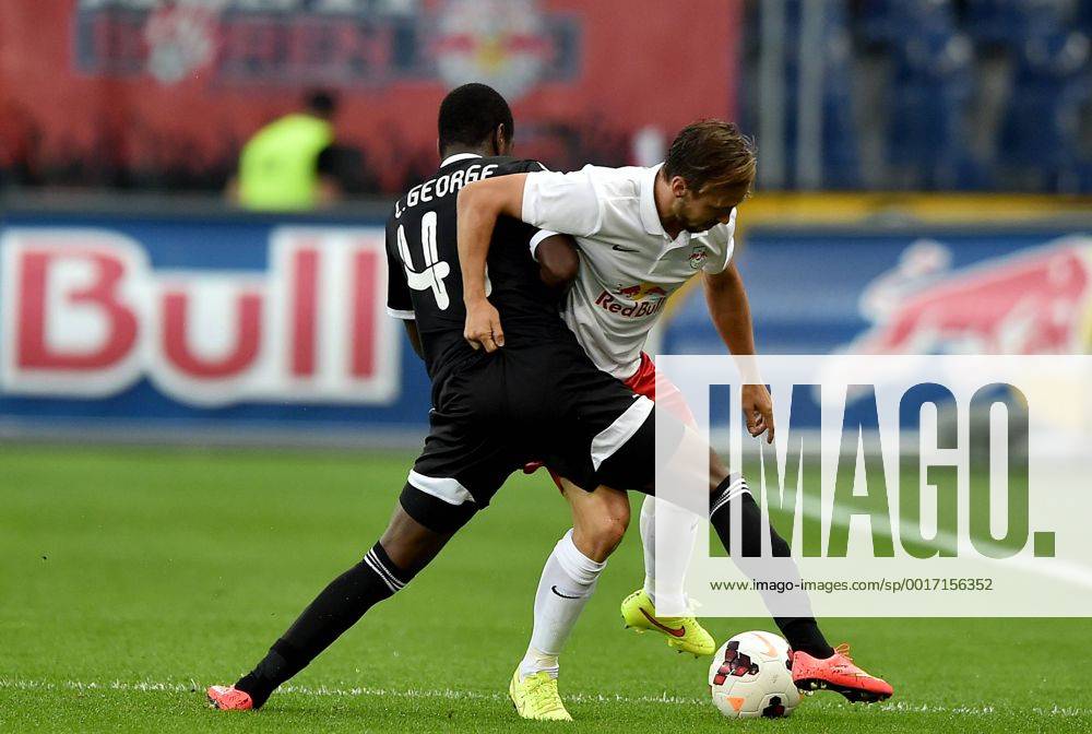 SOCCER - CL, RBS vs Qarabag SALZBURG,AUSTRIA,06.AUG.14 - SOCCER - UEFA Champions League, qualifying, Red Bull Salzburg vs Qarabag Agdam FK. Image shows Leroy George (Qarabag) and Andreas Ulmer (RBS).
