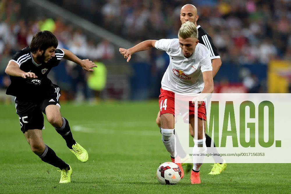 SOCCER - CL, RBS vs Qarabag SALZBURG,AUSTRIA,06.AUG.14 - SOCCER - UEFA Champions League, qualifying, Red Bull Salzburg vs Qarabag Agdam FK. Image shows Badavi Guseynov (Qarabag) and Kevin Kampl (RBS).
