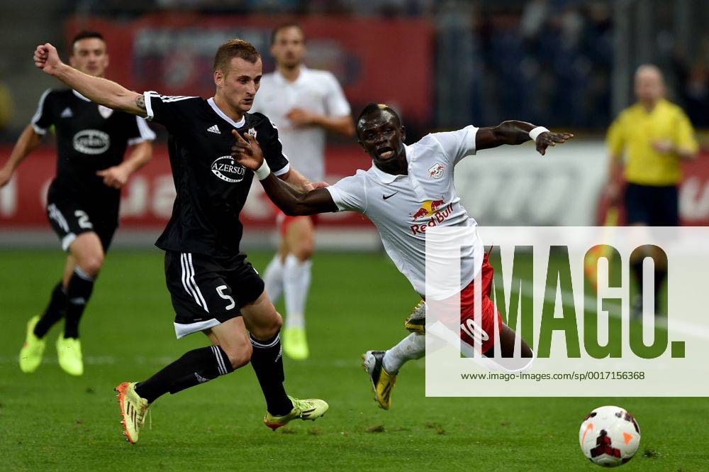 SOCCER - CL, RBS vs Qarabag SALZBURG,AUSTRIA,06.AUG.14 - SOCCER - UEFA Champions League, qualifying, Red Bull Salzburg vs Qarabag Agdam FK. Image shows Maksim Medvedev (Qarabag) and Sadio Mane (RBS).