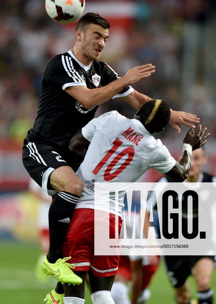 SOCCER - CL, RBS vs Qarabag SALZBURG,AUSTRIA,06.AUG.14 - SOCCER - UEFA Champions League, qualifying, Red Bull Salzburg vs Qarabag Agdam FK. Image shows Qara Qarayev (Qarabag) and Sadio Mane (RBS).