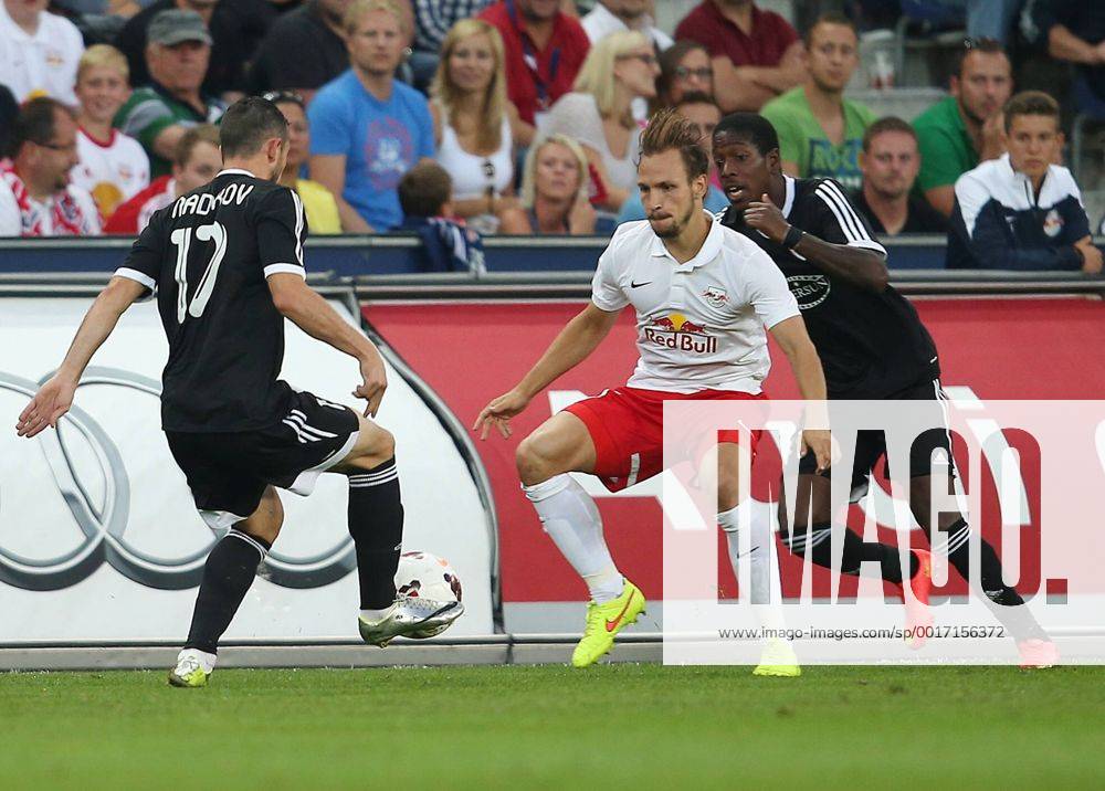 SOCCER - CL, RBS vs Qarabag SALZBURG,AUSTRIA,06.AUG.14 - SOCCER - UEFA Champions League, qualifying, Red Bull Salzburg vs Qarabag Agdam FK. Image shows Vueqar Nadirov (Qarabag), Andreas Ulmer (RBS) and Leroy George (Qarabag).