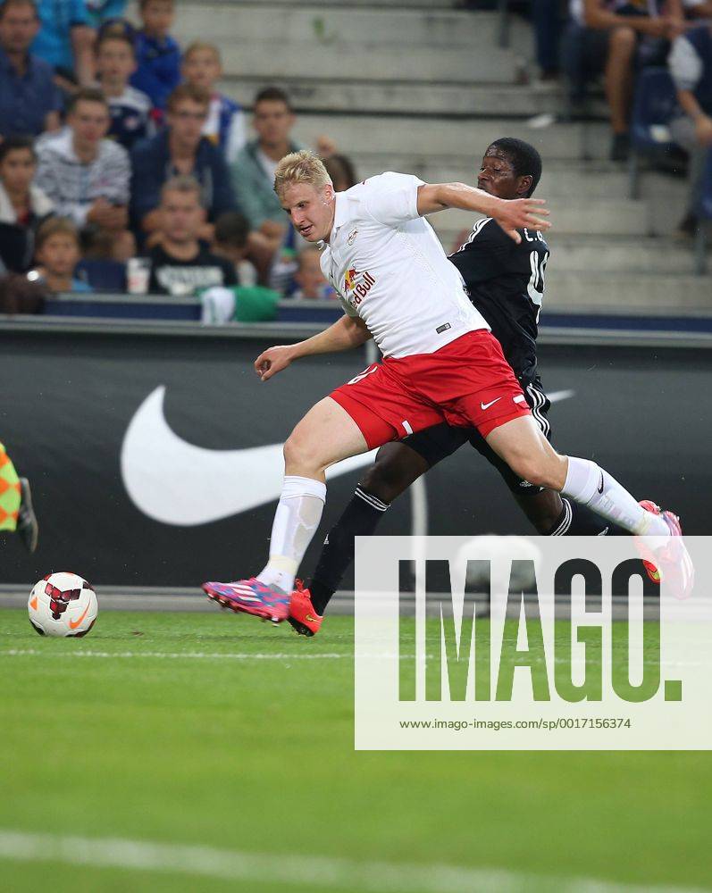 SOCCER - CL, RBS vs Qarabag SALZBURG,AUSTRIA,06.AUG.14 - SOCCER - UEFA Champions League, qualifying, Red Bull Salzburg vs Qarabag Agdam FK. Image shows Martin Hinteregger (RBS) and Leroy George (Qarabag).