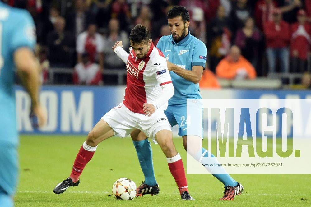 20140820 - LIEGE, BELGIUM: Standard s Tony Watt and Zenit s Ezequiel Garay fight for the ball during the first leg match between Belgian first division soccer team Standard de Liege and Russian team FC Zenit Saint Petersburg in the playoffs for the UEFA Champions League competition, Wednesday 20 August 2014, in Liege. YORICKxJANSENS premiumd 19082425