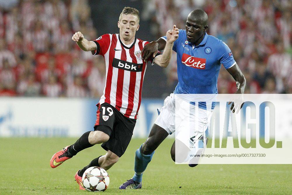 Athletic de Bilbao s Iker Muniain (l) and SSC Napoli s Kalidou Koulibaly during Champions League 2014 2015 Play-off 2nd leg match.August 27,2014. (2014082735)