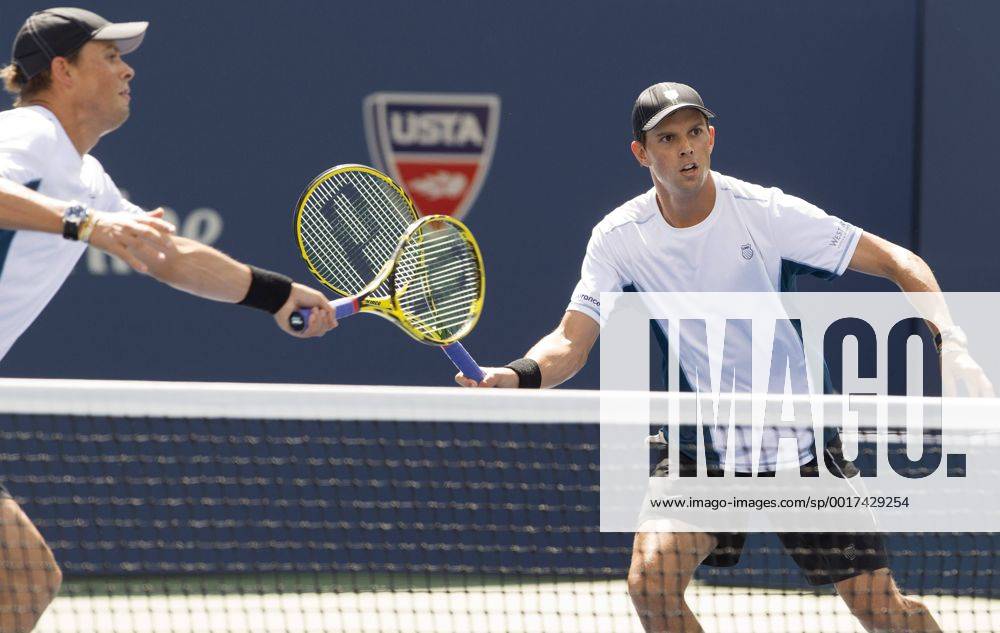 TENNIS - ATP, US Open 2014 NEW YORK CITY,NEW YORK,USA,07.SEP.14 - TENNIS - ATP Tennis Herren World Tour, US Open 2014, Grand Slam, Flushing Meadows, doubles, final. Image shows Bob and Mike Bryan (USA).