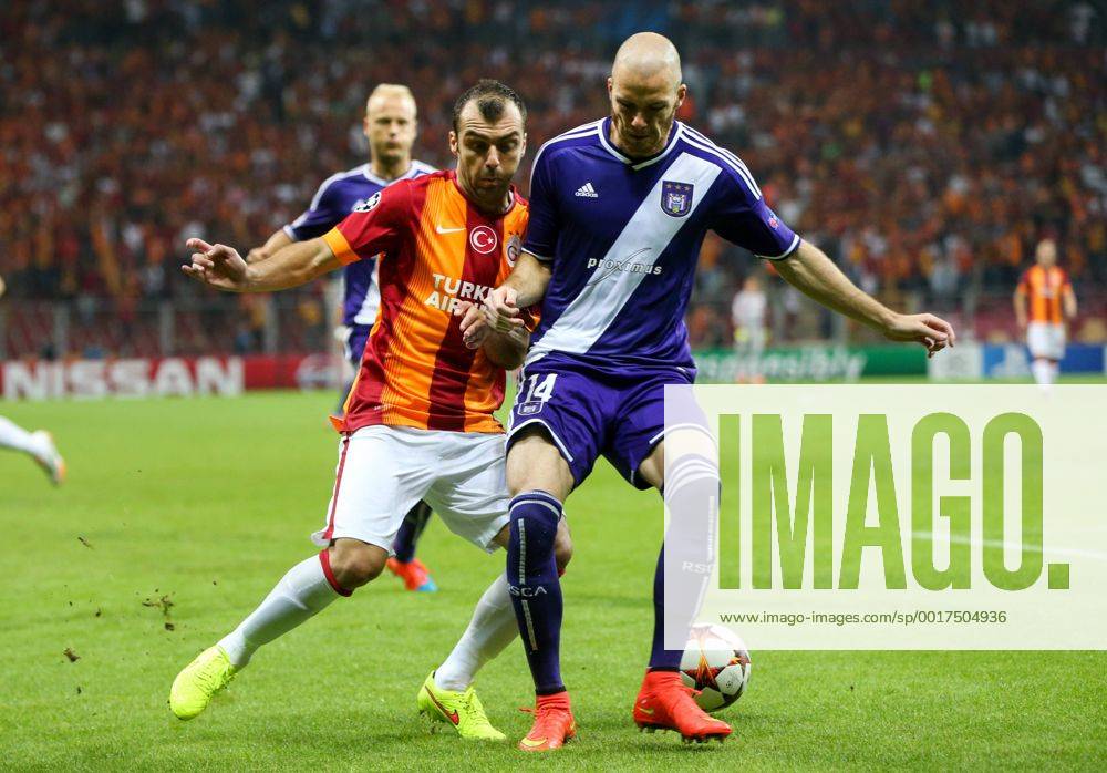 ISTANBUL - Galatasaray s Goran Pandev and Anderlecht s Bram Nuytinck fight for the ball during a soccer game between Turkish team Galatasaray S.K. and Belgian team RSC Anderlecht in the Tuk Telekom Arena in Istanbul, Turkey, Tuesday 16 September 2014, on day 1 of the group stage of the UEFA Champions League competition, in group D. VIRGINIExLEFOUR premiumd Highlight 04316847