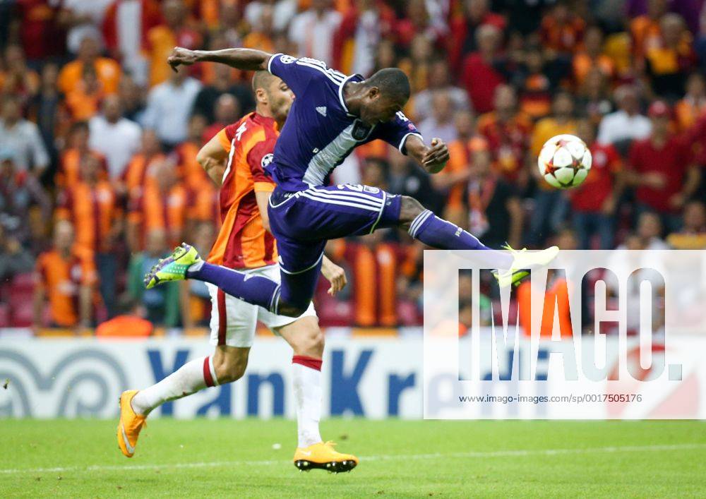 ISTANBUL - Galatasaray s Burak Yilmaz and Anderlecht s Chancel Mbemba fight for the ball during a soccer game between Turkish team Galatasaray S.K. and Belgian team RSC Anderlecht in the Tuk Telekom Arena in Istanbul, Turkey, Tuesday 16 September 2014, on day 1 of the group stage of the UEFA Champions League competition, in group D. VIRGINIExLEFOUR premiumd Highlight 04316876