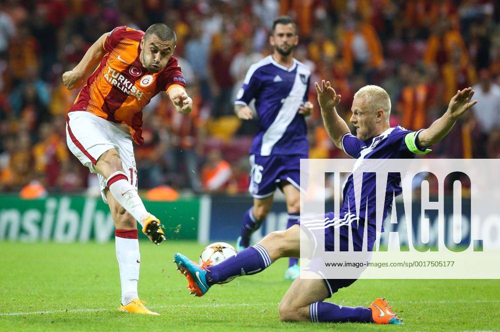ISTANBUL - Galatasaray s Burak Yilmaz and Anderlecht s Olivier Deschacht fight for the ball during a soccer game between Turkish team Galatasaray S.K. and Belgian team RSC Anderlecht in the Tuk Telekom Arena in Istanbul, Turkey, Tuesday 16 September 2014, on day 1 of the group stage of the UEFA Champions League competition, in group D. VIRGINIExLEFOUR premiumd Highlight 04316879