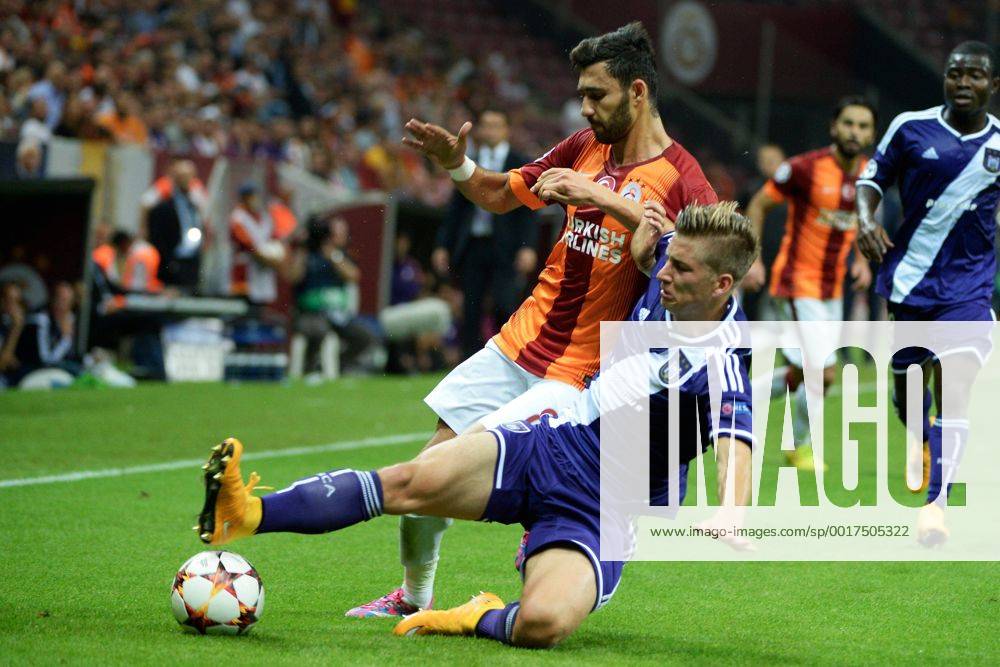 Veysel San of Galatasaray and Dennis Praet of RSC Anderlecht Galatasaray Istanbul vs RSC Anderlecht PhotoNewsxPanoramic