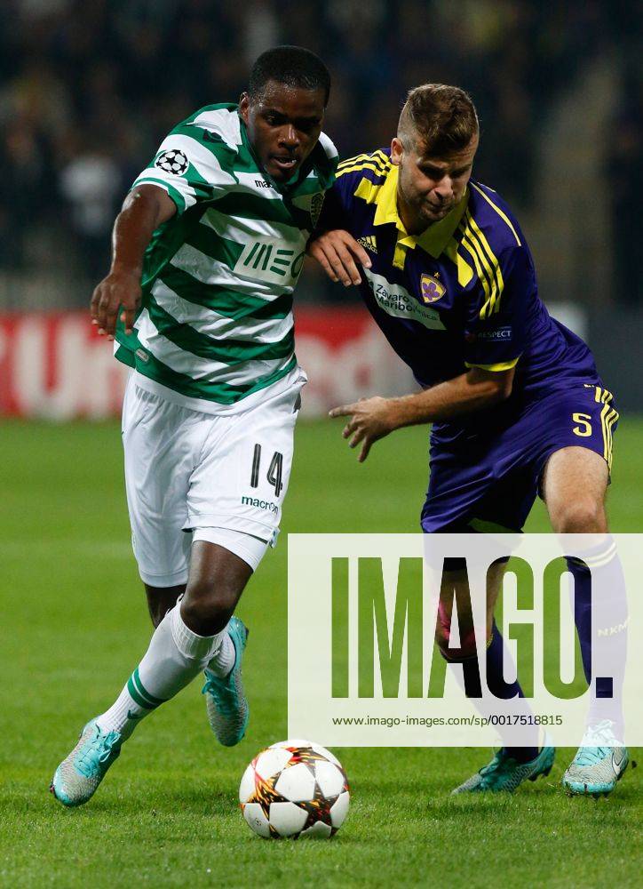 SOCCER - CL, Maribor vs Sporting MARIBOR,SLOVENIA,17.SEP.14 - SOCCER - UEFA Champions League, group stage, NK Maribor vs Sporting Clube de Portugal. Image shows William Carvalho (Sporting) and Zeljko Filipovic (Maribor).