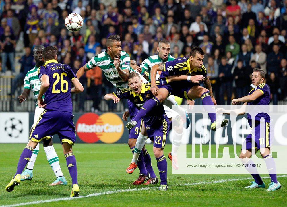 SOCCER - CL, Maribor vs Sporting MARIBOR,SLOVENIA,17.SEP.14 - SOCCER - UEFA Champions League, group stage, NK Maribor vs Sporting Clube de Portugal. Image shows Aleksander Rajcevic (Maribor), Islam Slimani (Sporting), Dare Vrsic and Agim Ibraimi (Maribor).