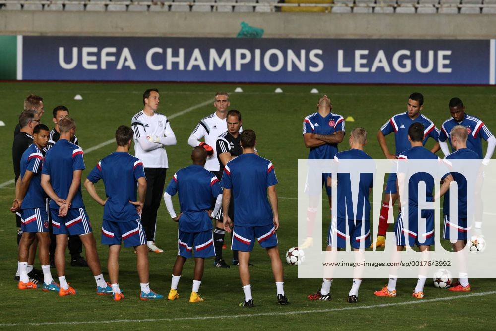 Frank de Boer with players of Ajax FC practice before the game against Apoel in Nicosia on Sep 29,2014