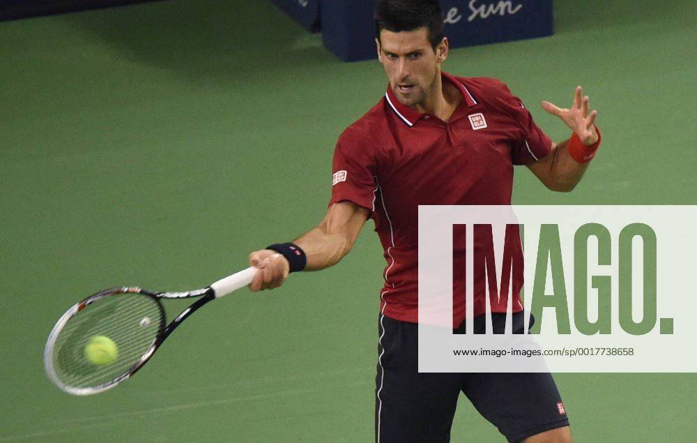 Novak Djokovic of Serbia returns a shot in the quarterfinal of the men s singles during the 2014 Shanghai Rolex Masters tennis tournament in Shanghai, China, 10 October 2014. Shanghai Rolex Masters 20141010_66283