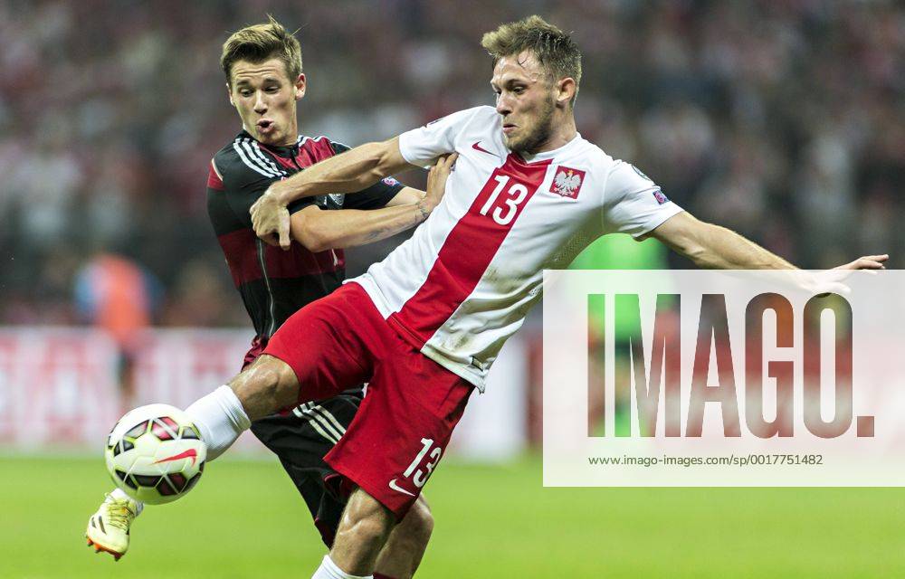 Erik Durm (GER), Maciej Rybus (POL) 11.10.2014, Warschau, Polen vs. Deutschland Â